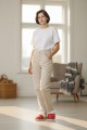 Create a high-quality virtual try-on from the product reference Generate a high-quality virtual try-on image of the provided object worn by the provided model, respect the model's face details Strictly preservi (1).jpg